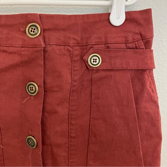 Anthropologie rust red skirt with gold accent buttons and pockets - Picture 3 of 4